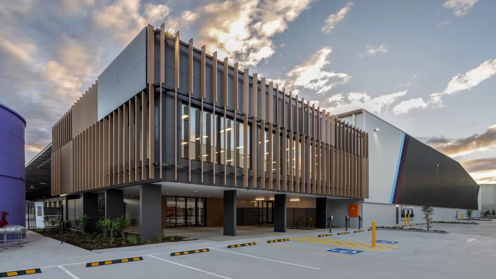 Timber-batten office facade at dusk, Acacia Ridge Business Park